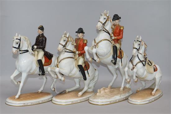 Four Augustin Wien Lipizzaner horses, three with riders, tallest 29cm
